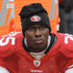 San Francisco 49ers cornerback Phillip Adams sits on the sideline during the first quarter of an NFL football game in San Francisco.